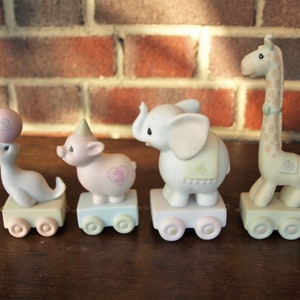 Precious Moments Porcelain Menagerie Birthday Figurines – Elephant, Giraffe, Seal and Pig 1985