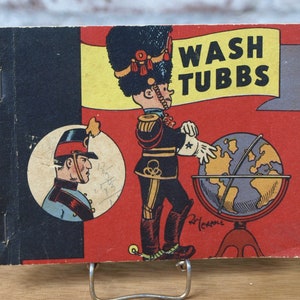 Wash Tubbs in Pandemonia by Roy Crane - First Edition, Thus - NEA Service, 1932; Whitman Pub. Co, 1934 - Softcover w/ Stapled Binding, VG