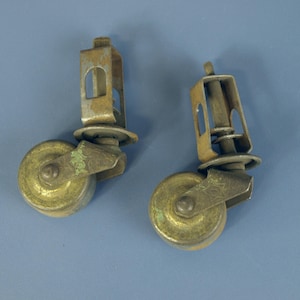 Vintage Caster Wheels with Grip-Neck Stems, Set of 2 with 1.25&quot; Diameter Wheels and 2&quot; Stems in Good Aged Working condition