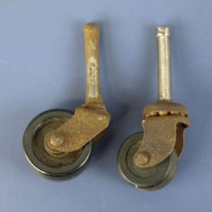 Vintage Bakelite Caster Wheels with stems, Set of 2 in Different Sizes