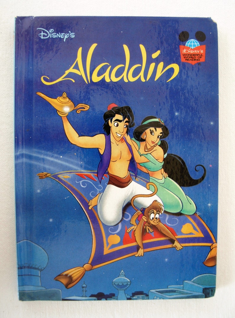 Aladdin the magic lamp storytime. аладдин на английском. аладдин постер на английском. джинни алладин. плакаты мультфильмов.