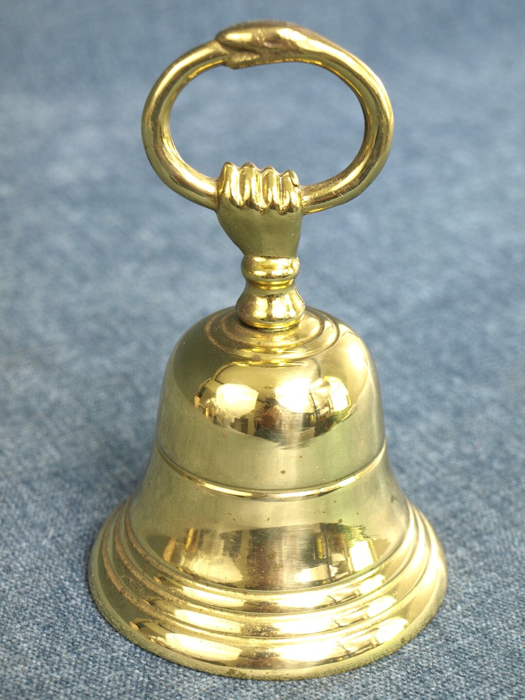 Vintage Brasscrafters 6 Brass Bell With Hand Gripping an Ouroboros