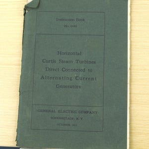 May include: A vintage instruction book with a dark green cover. The cover features text in a rectangular box that reads "Instruction Book No. 8488". Below, the text reads "Horizontal Curtis Steam Turbines Direct Connected to Alternating Current Generators".