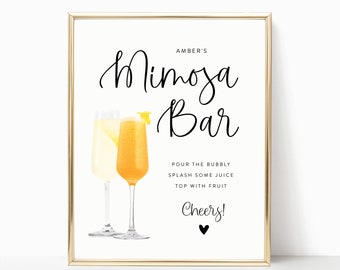 May include: A printable sign for a mimosa bar with a gold frame. The sign says "Amber's Mimosa Bar" with a watercolor illustration of two glasses of mimosa. The text below the illustration says "Pour the bubbly, splash some juice, top with fruit, Cheers!"
