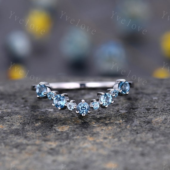 Sterling Silver London and Swiss Blue Topaz Star Curved Ring Sterling Silver London and Swiss Blue Topaz Star Curved Ring