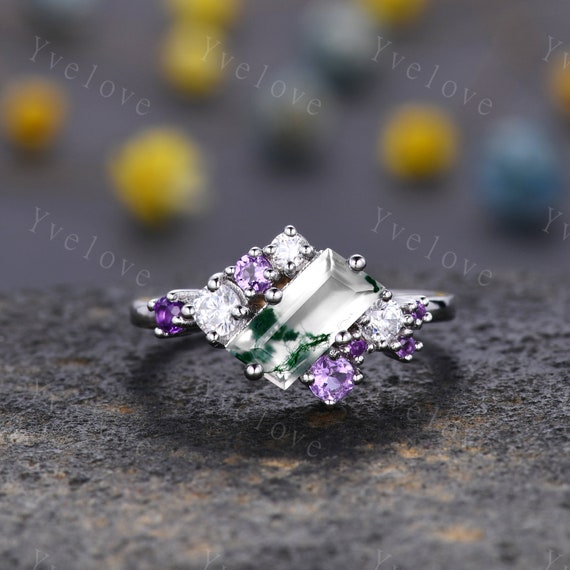 Green and purple engagement on sale ring