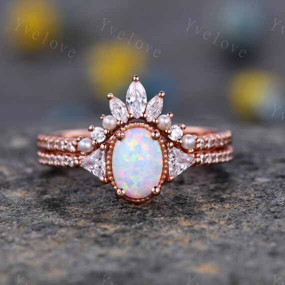 Diamond ring with opal side stones sale