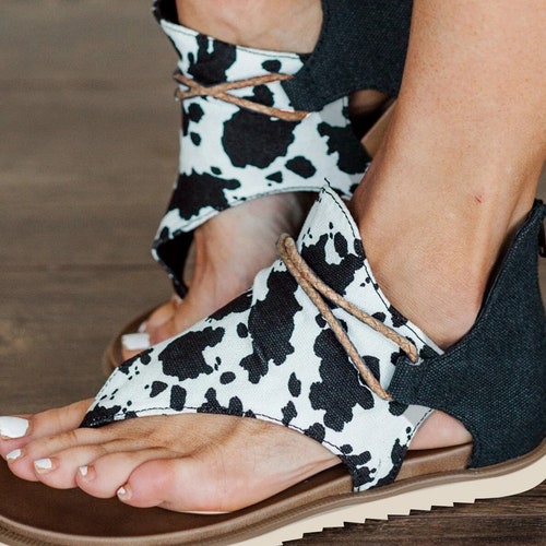 outwoods cow print sandals