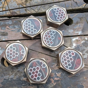 Every day carry pocket portal in hex brass. The Dark