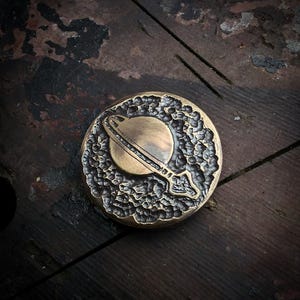 Brass every day carry coin. Adventure Awaits