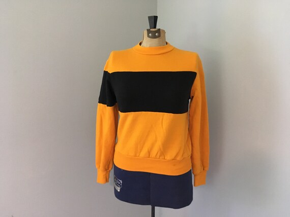 yellow black sweatshirt