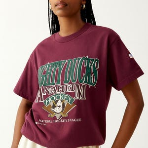 MIGHTY DUCKS Hockey T-Shirt 1993 Women's SMALL Super Soft Worn In 90's  Merchandise Retro Collectors item Clothing Faded Holes Sports Fan