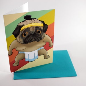 May include: A greeting card featuring a cartoon pug dressed as a sumo wrestler. The pug is wearing a yellow headband and a white loincloth. The background is a retro-style pattern of red, yellow, green, and blue stripes.