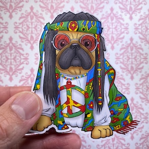May include: A cartoon pug wearing a peace sign shirt, a colorful headband, and round sunglasses. The pug has long black hair and is wearing a colorful scarf.