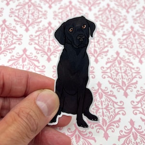 May include: A black Labrador Retriever dog sticker with a white background. The dog is sitting with its ears perked up and looking directly at the viewer.