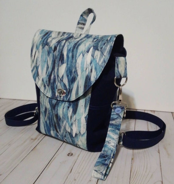 Flap hotsell backpack purse