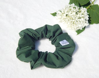 Elastic hair scrunchie for women in plain cotton fabric in juniper green color