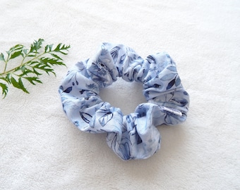 Scrunchie perfect accessory for elastic hair with floral patterns in blue colors
