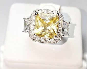 6CTW Cushion Cut Yellow Canary CZ & Clear Pave + Emerald CZ Halo Ring