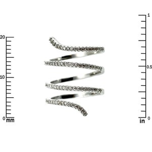May include: A silver ring with a spiral design and clear cubic zirconia stones.