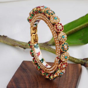 Buy this multicolour banglecrafted with 14k yellow gold electromagnetic plating and tarnish resistant