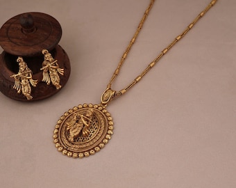 Beautiful gold plated Krishna pendent set with earring.