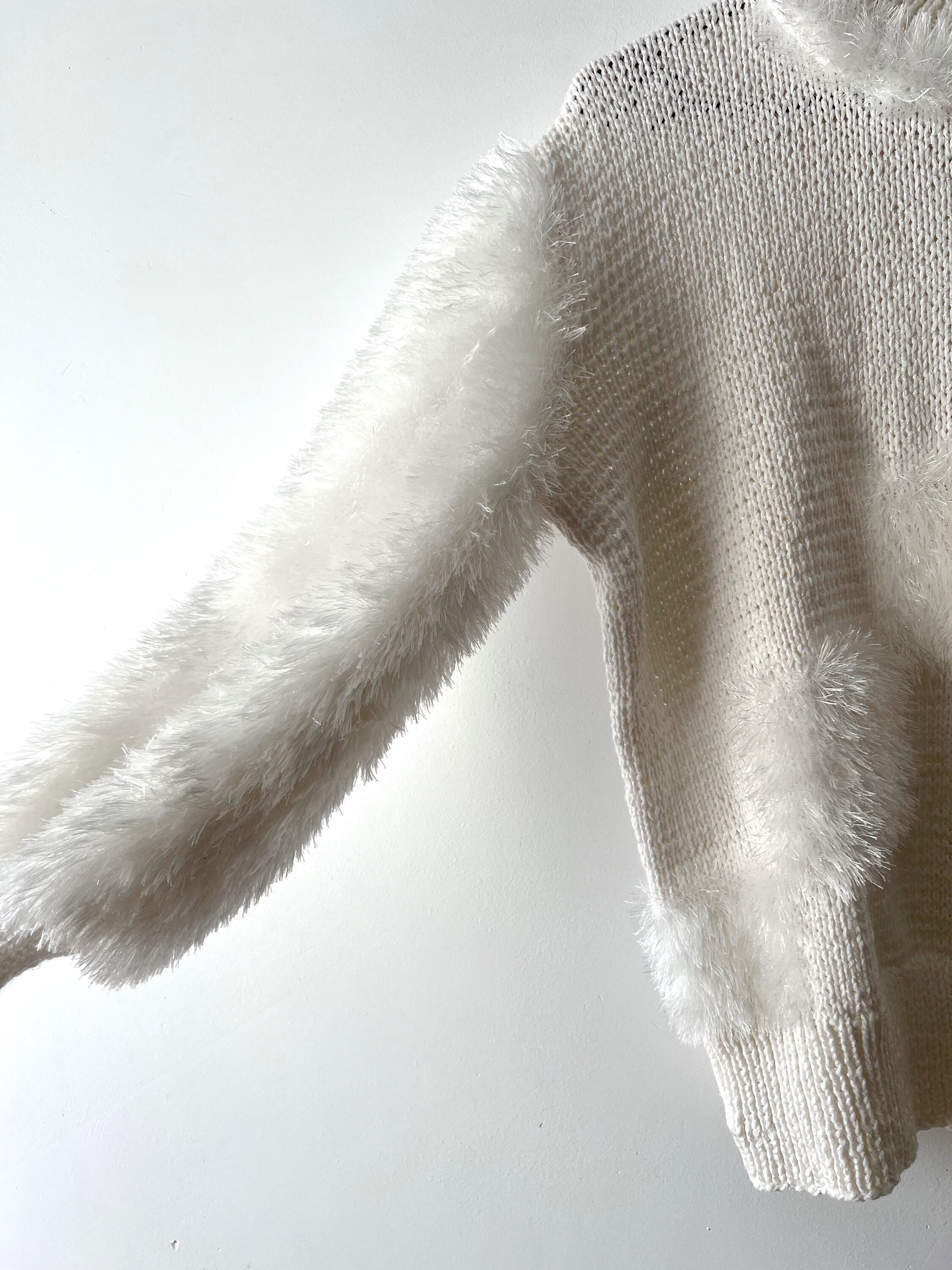 Unknown vintage fluffy feather knit.