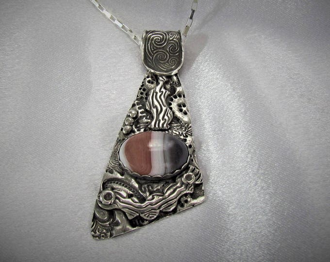 Item 6112 - "Waves of Encouragement" - Fine & Sterling Silver Hand sculpted carved Pendant set with Genuine Botswana Agate