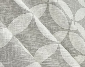May include: White sheer curtains with a grey geometric pattern of overlapping circles. The fabric has a linen texture.