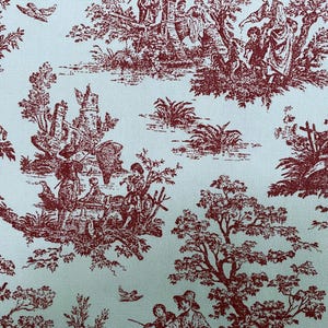 May include: A fabric with a repeating toile pattern in burgundy on a light blue background. The design depicts scenes of people, trees, and buildings. The fabric has a classic, vintage aesthetic.