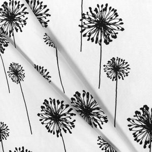 May include: White fabric with a black and white dandelion print. The dandelions are stylized and have a delicate, whimsical look.