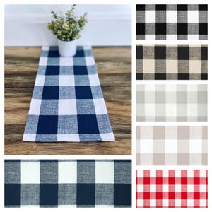 May include: A set of 10 table runners in various colors and patterns, including black and white buffalo check, gray and white buffalo check, and red and white buffalo check. The table runners are made of a soft, woven fabric and are perfect for adding a touch of farmhouse style to your home.