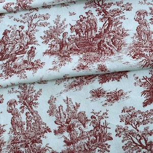 May include: A fabric with a repeating toile de Jouy pattern in burgundy on a light blue background. The design depicts pastoral scenes with figures, trees, and architectural elements, creating a classic, decorative textile.