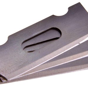 May include: A stack of silver utility knife blades. Each blade has a sharp edge and a curved notch on one end. The blades are made of metal and have a rectangular shape with a central oval opening.