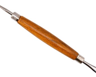 May include: A sculpting tool with a wooden handle, a rounded metal tip and a flat, rounded metal blade.