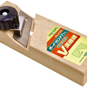 May include: A wooden hand plane with a black adjustment knob and a silver blade. A sticker with Japanese text is affixed to the side. The tool is designed for woodworking and creating V-grooves.