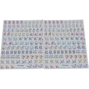May include: Two sheets of alphabet stickers with colorful illustrations. Each letter is decorated with a different animal or object. The stickers are acid-free and feature the "N Designs" logo.