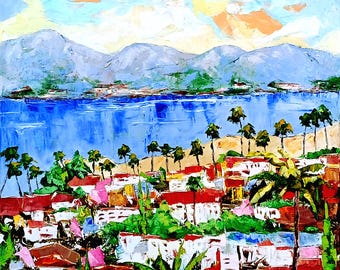 May include: An impressionistic painting of a coastal town with red-roofed buildings, palm trees, and a blue ocean. Mountains are visible in the background under a cloudy sky. The artwork uses thick brushstrokes and vibrant colors.