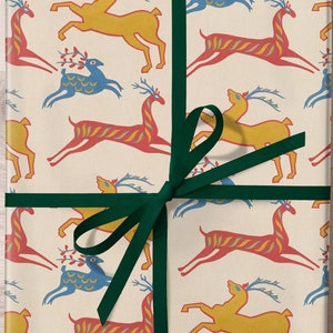 Rouleau de papier cadeau folk avec cerf, papier cadeau de Noël des bois, hiver bohème, emballage cadeau classique des fêtes, modèle d'illustration cher vintage