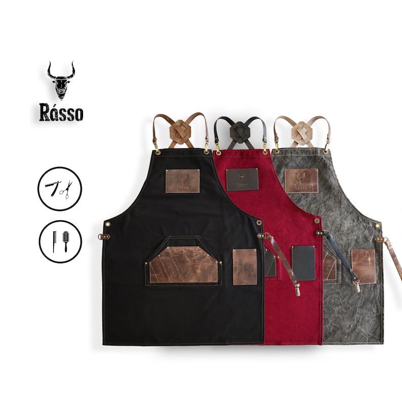 May include: Three canvas aprons in black, red, and gray with brown leather accents and adjustable straps. Each apron has a logo patch with a bull's head and the text "Rasso".