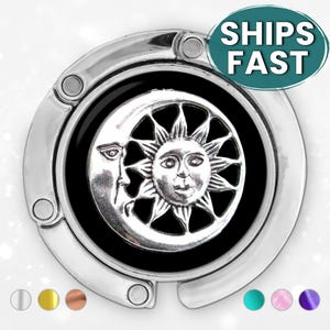 Gancho para bolso de mesa sol y luna o portacredencial retráctil, regalo celestial
