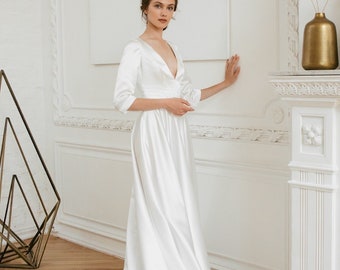 Satin wedding dress • deep V-neckline • long sleeves dress • civil wedding dress • simple wedding dress • a-line dress • romantic dress