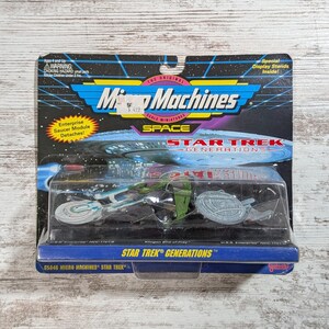 May include: A Micro Machines Star Trek Generations space toy set in original packaging. The blister pack contains a miniature U.S.S. Enterprise NCC-1701-B and a Klingon Bird-of-Prey. The card features blue and black graphics with yellow text.