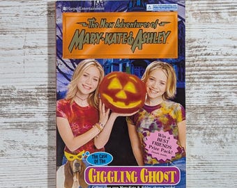 The New Adventures of Mary-Kate & Ashley The Case of the Giggling Ghost Paperback Book (First Printing, 2002)