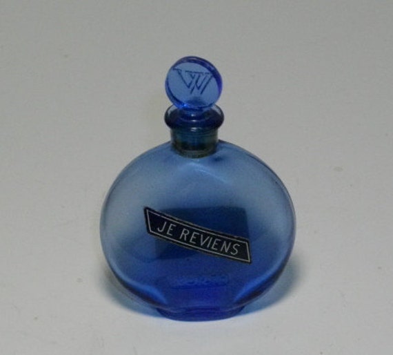 worth perfume blue bottle