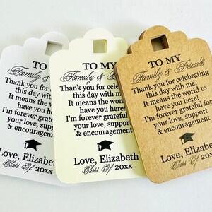 May include: Three graduation thank you tags with a black and white graduation cap design. The tags are printed with the text "To My Family & Friends" and a message of gratitude. The tags are on a white background.