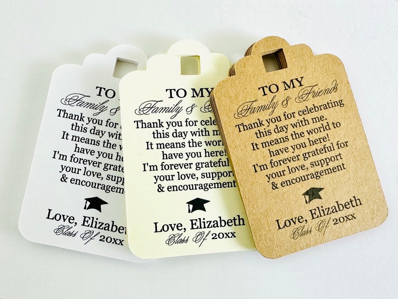 May include: Three graduation thank you tags with a black and white graduation cap design. The tags are printed with the text "To My Family & Friends" and a message of gratitude. The tags are on a white background.