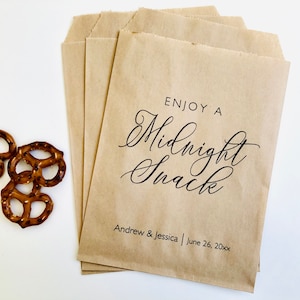 May include: Brown paper bags with the text "Enjoy a Midnight Snack" in black script font. The bags also include the text "Andrew & Jessica | June 26, 20xx".