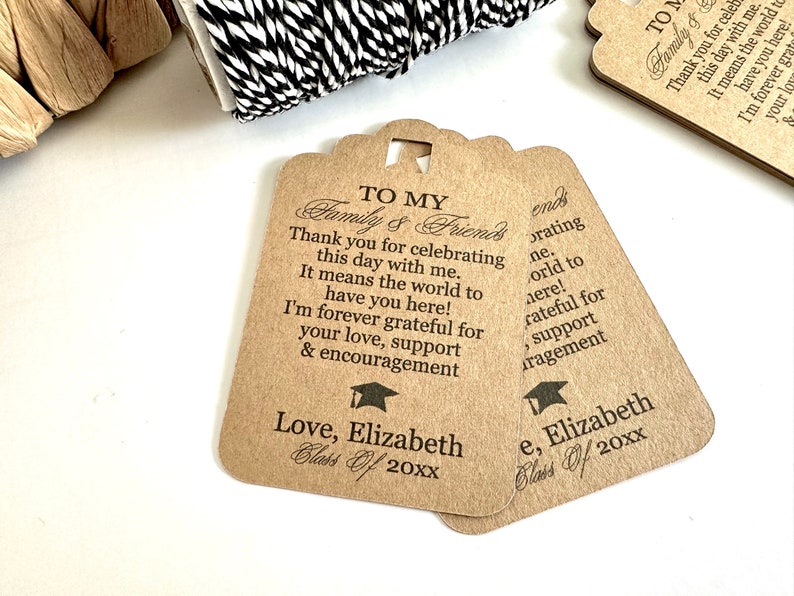 May include: Two brown kraft paper gift tags with a graduation cap design and the text "To My Family & Friends" and "Thank you for celebrating this day with me. It means the world to have you here! I'm forever grateful for your love, support & encouragement."  The tags are signed "Love, Elizabeth Class of 20XX" and "e, Elizabeth Class of 20XX".