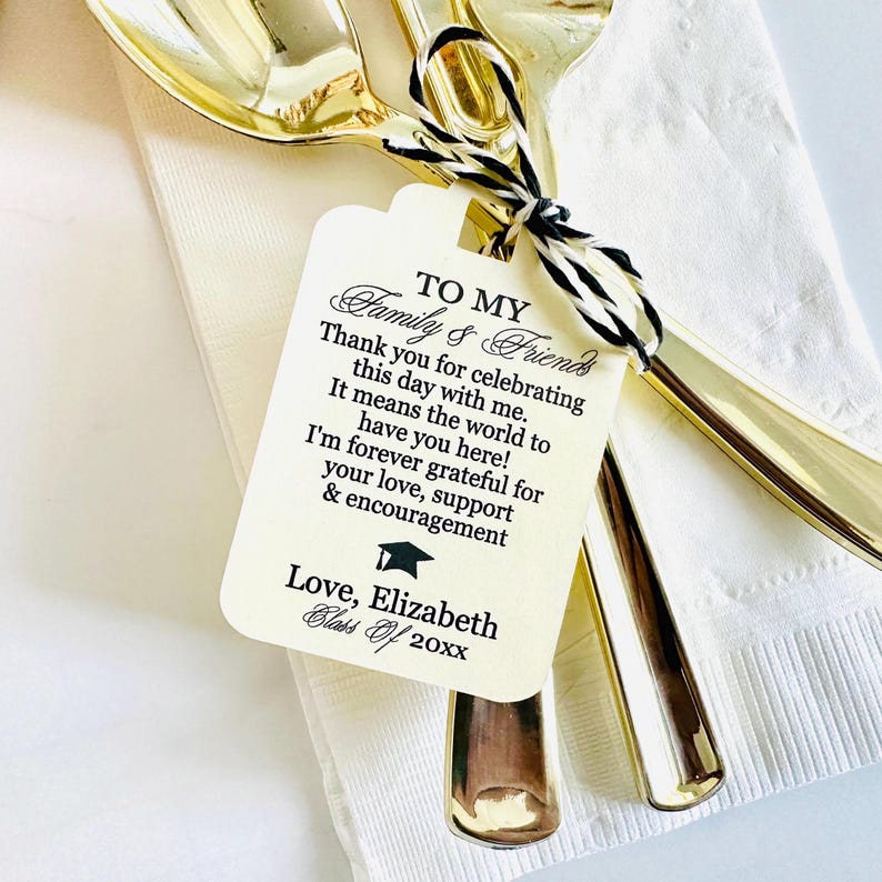 May include: White card with black text that reads "To My Family & Friends" and "Thank you for celebrating this day with me. It means the world to have you here! I'm forever grateful for your love, support & encouragement. Love, Elizabeth Class of 20xx".